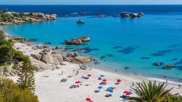 Beautiful sandy beach in with clear blue ocean waves