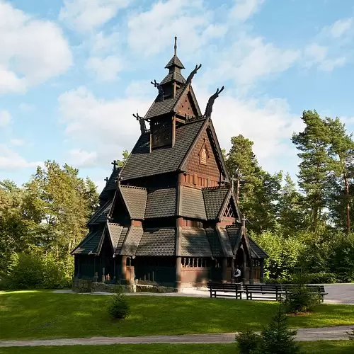 the-stave-church-from Oslo cityscape with waterfront and modern architecture – part of the Denmark Tour Package itinerary